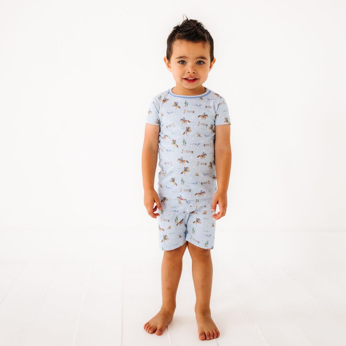 Little Wranglers short pajamas by Luna + Arlo featuring soft fabric, playful print, and comfortable fit for kids.
