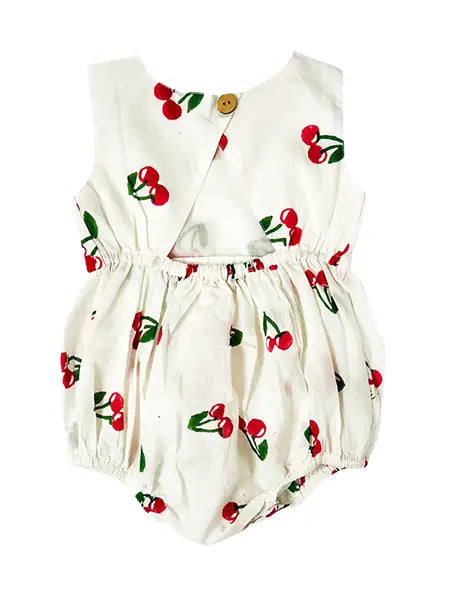 Eight Thousand Miles cherry back cut-out romper with stylish open back and fitted design, perfect for casual summer wear.