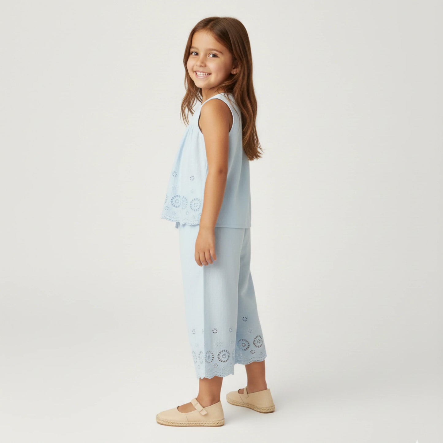 Light blue organic eyelet top and pants set by MakeMake, featuring eyelet details and a comfortable, stylish design.