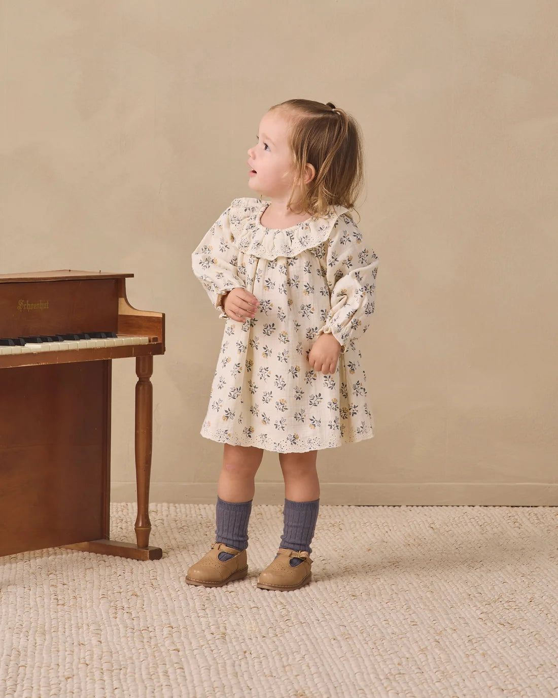 French floral long sleeve Isla dress by Quincy Mae featuring a delicate floral pattern and soft fabric in a feminine style.