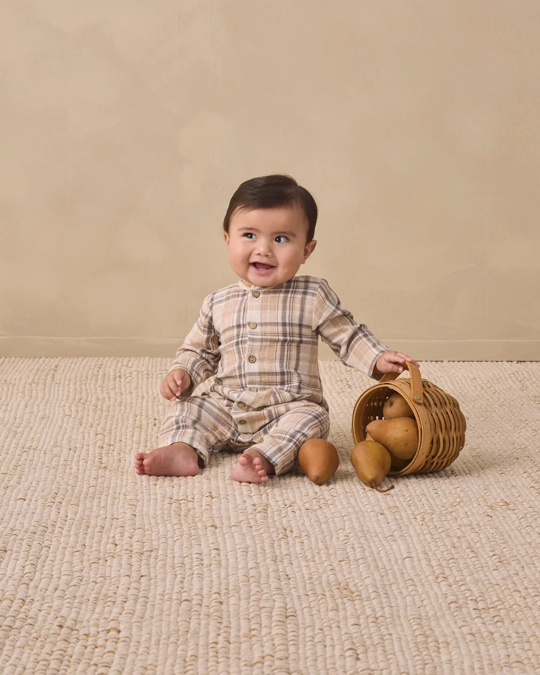 Quincy Mae fall plaid woven jumpsuit with front pockets, featuring a cozy, stylish design suitable for cooler weather.