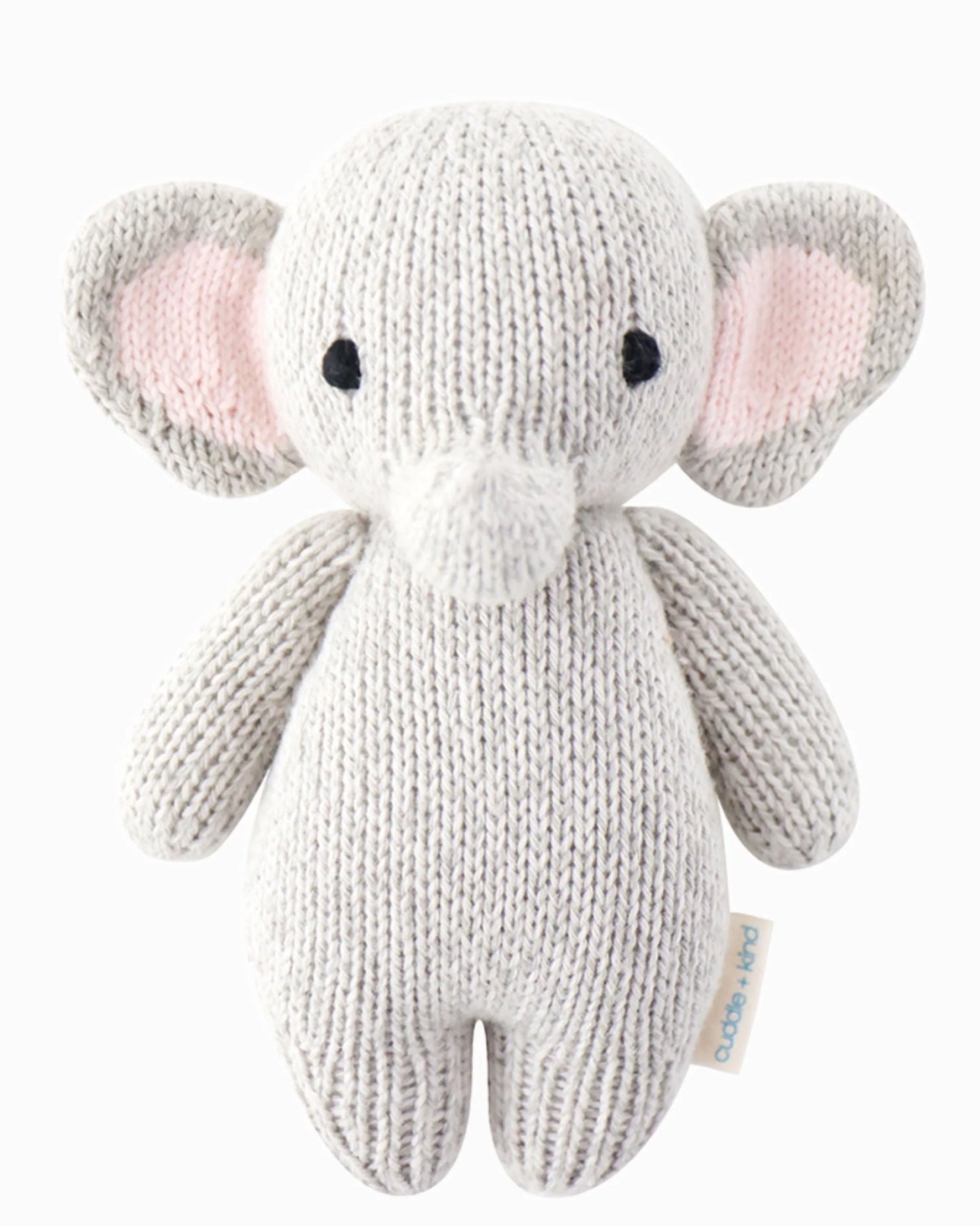 Soft baby elephant plush toy from cuddle + kind with large ears and gentle expression, perfect for cuddling and nursery decor.
