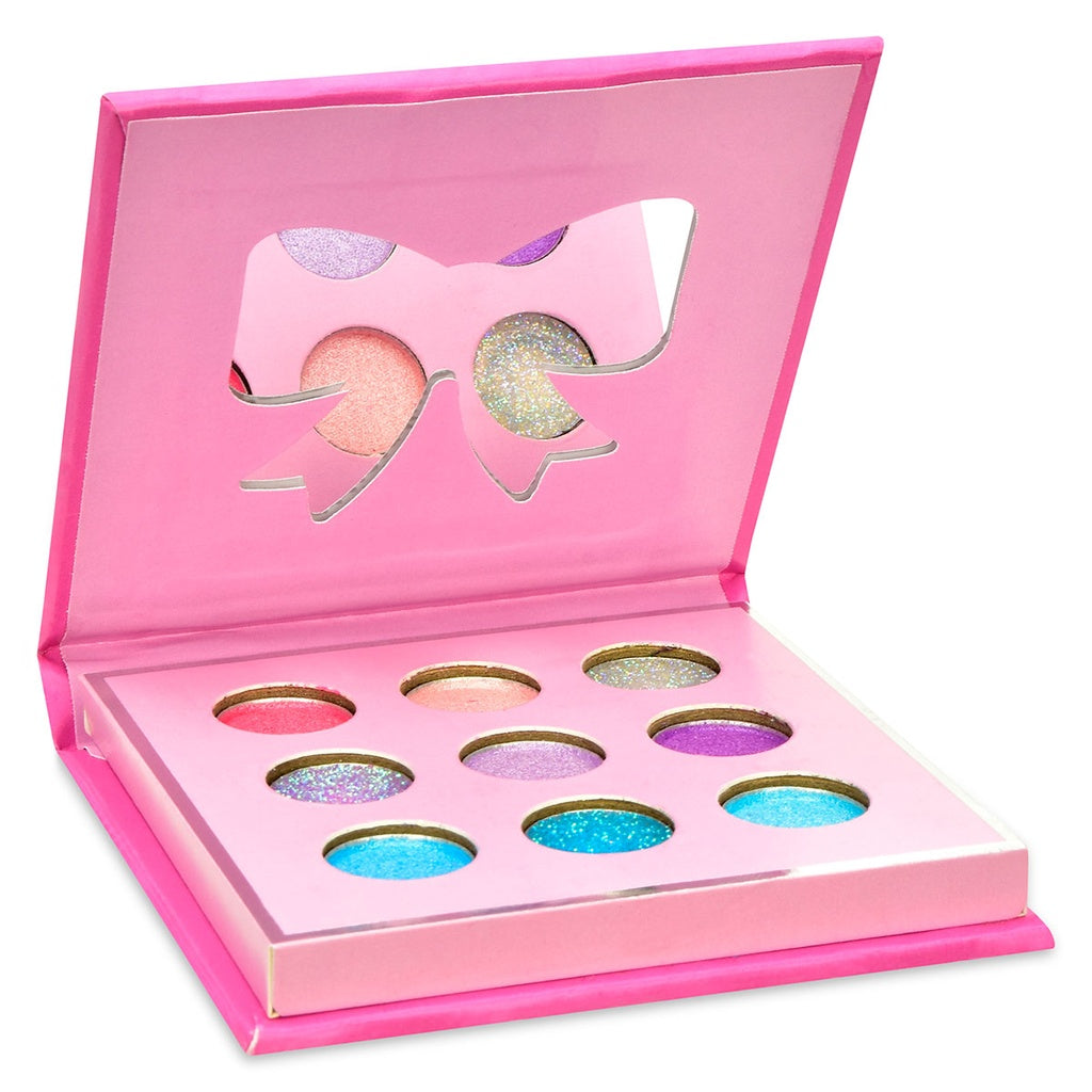 Iscream Beautiful Bows eyeshadow palette featuring colorful, bow-inspired makeup designs in a sleek compact.