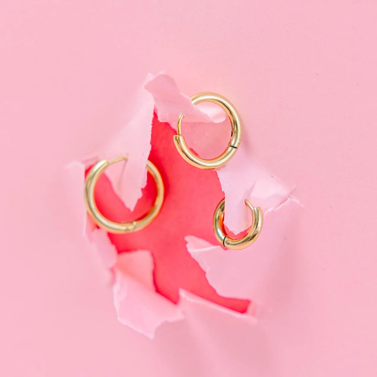Gold Huggies earrings from Pierced Co with a sleek, minimalist design perfect for everyday wear.