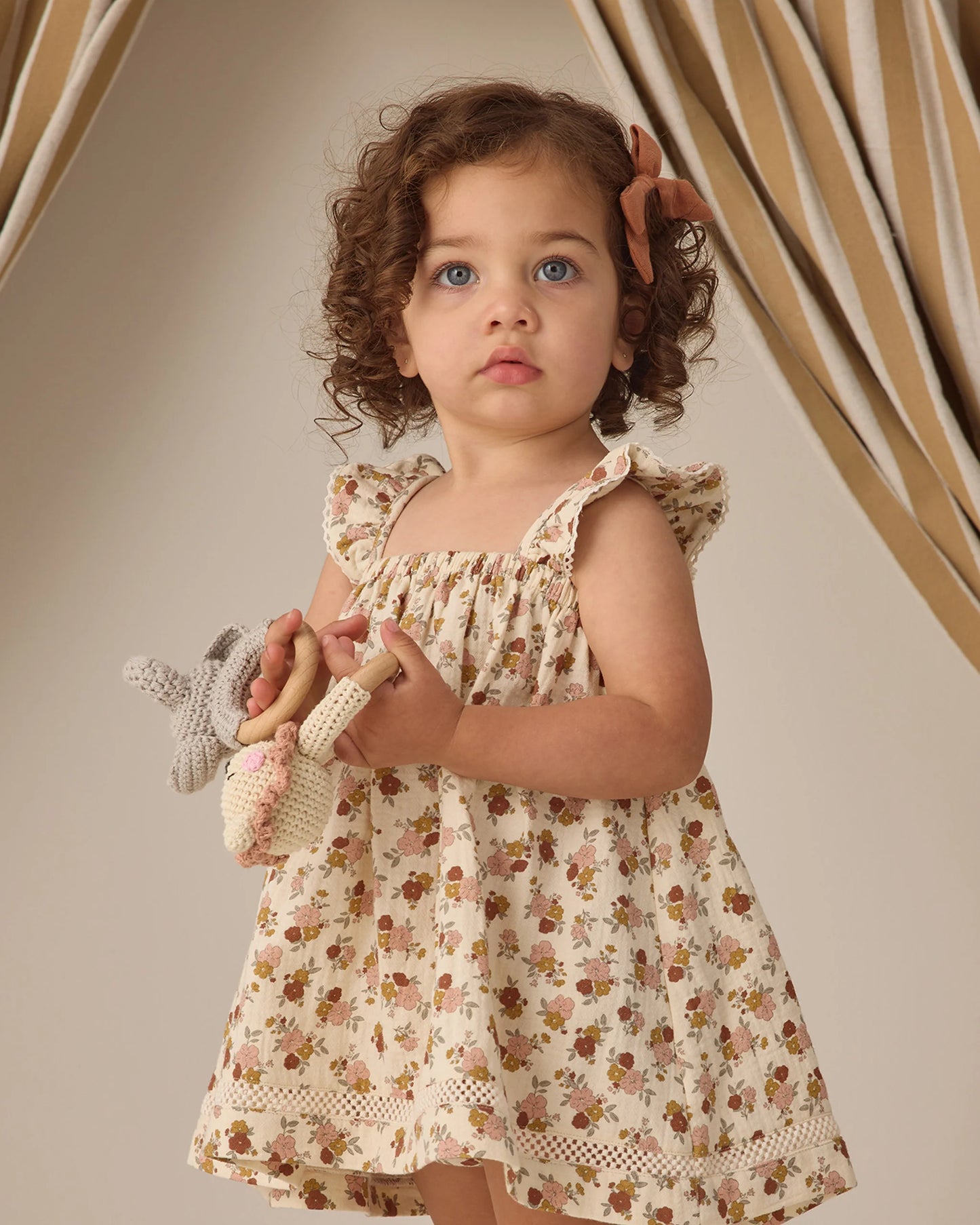 Quincy Mae Bloom Ruffle Tank Dress in soft fabric with ruffle details and sleeveless design, perfect for casual or special occasions.