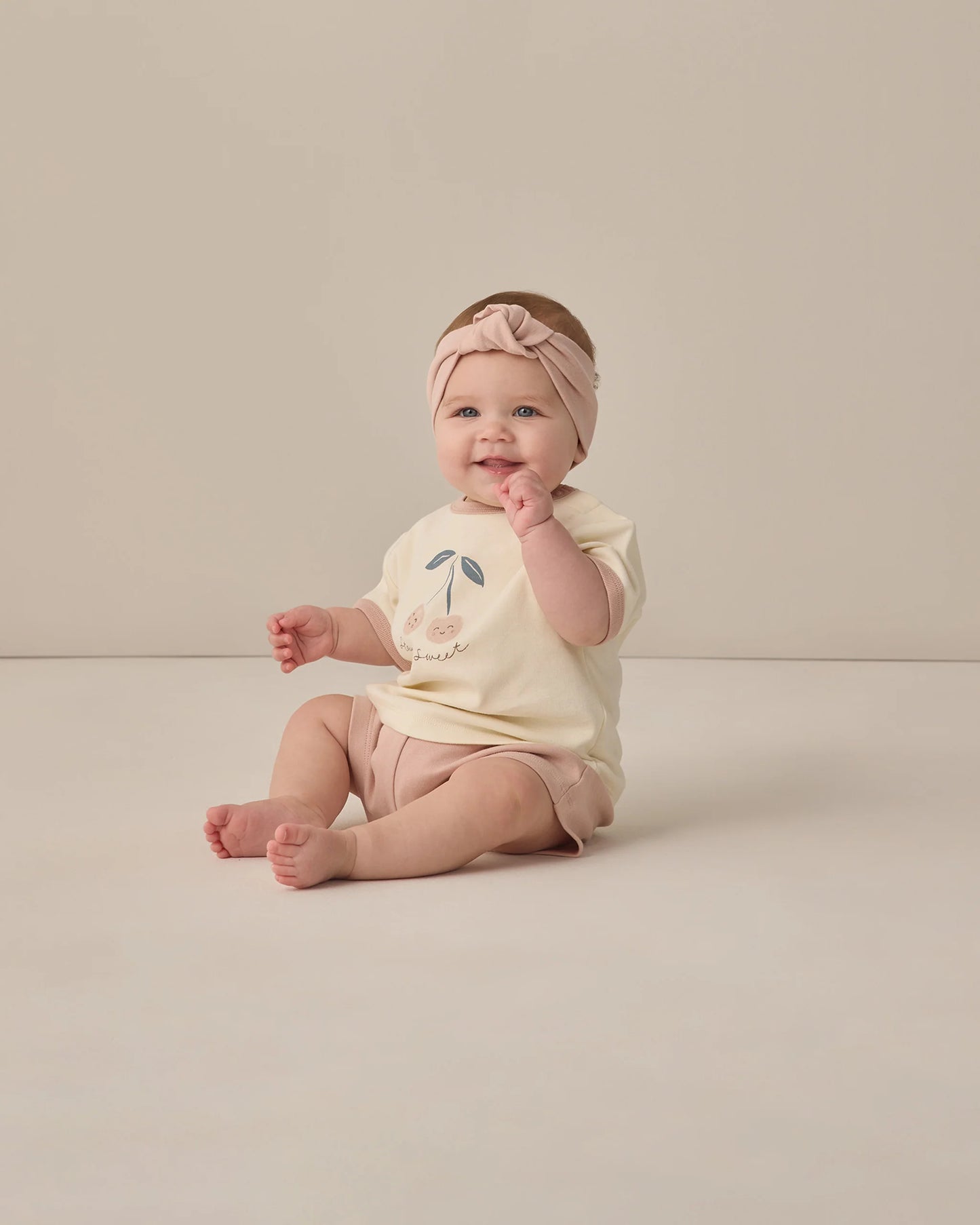 Quincy Mae blush pink play shorts for kids, soft fabric with elastic waistband, casual and comfortable for everyday wear