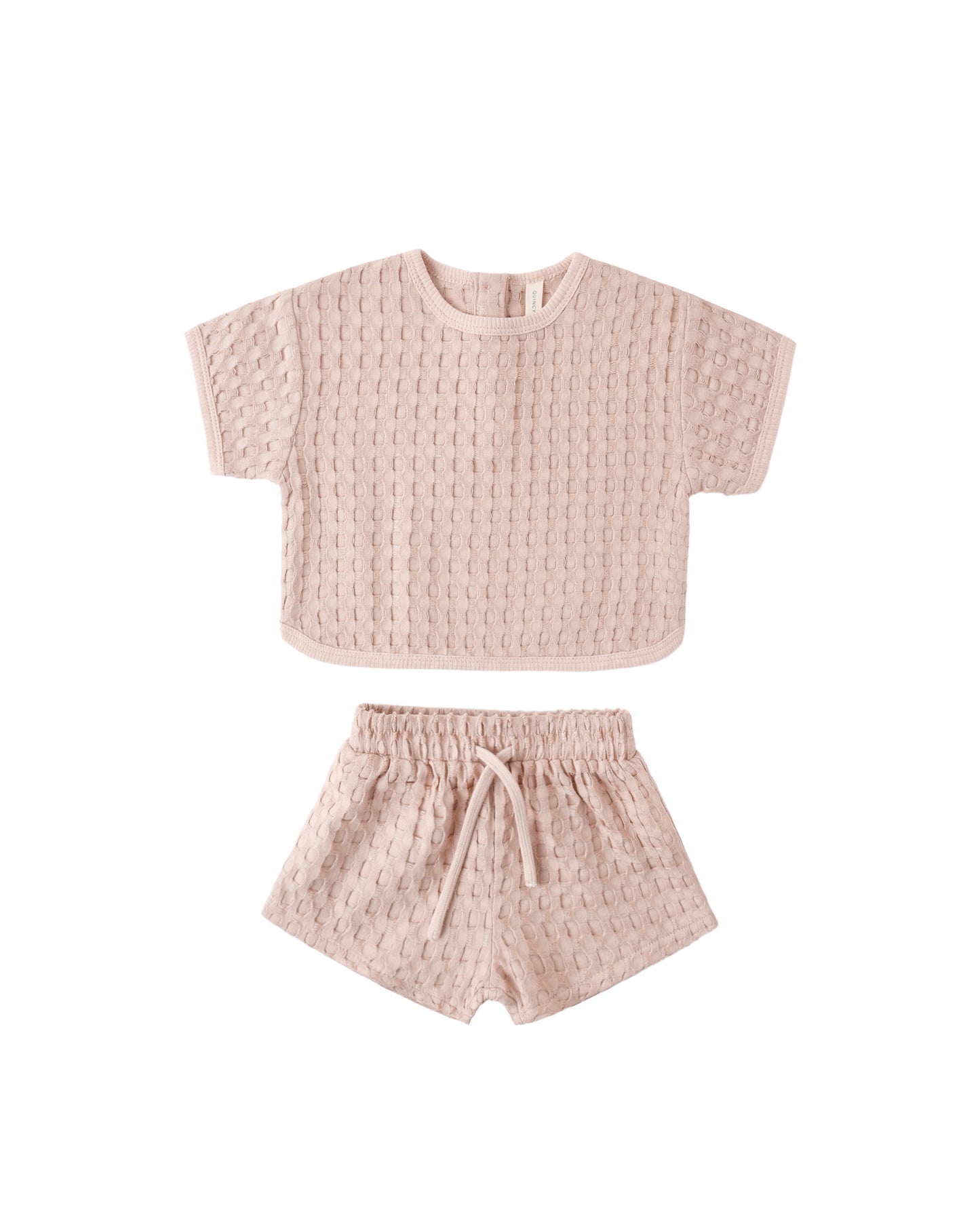 Quincy Mae Blush Jayden Set with soft pink fabric and matching accessories, perfect for babies or young children.