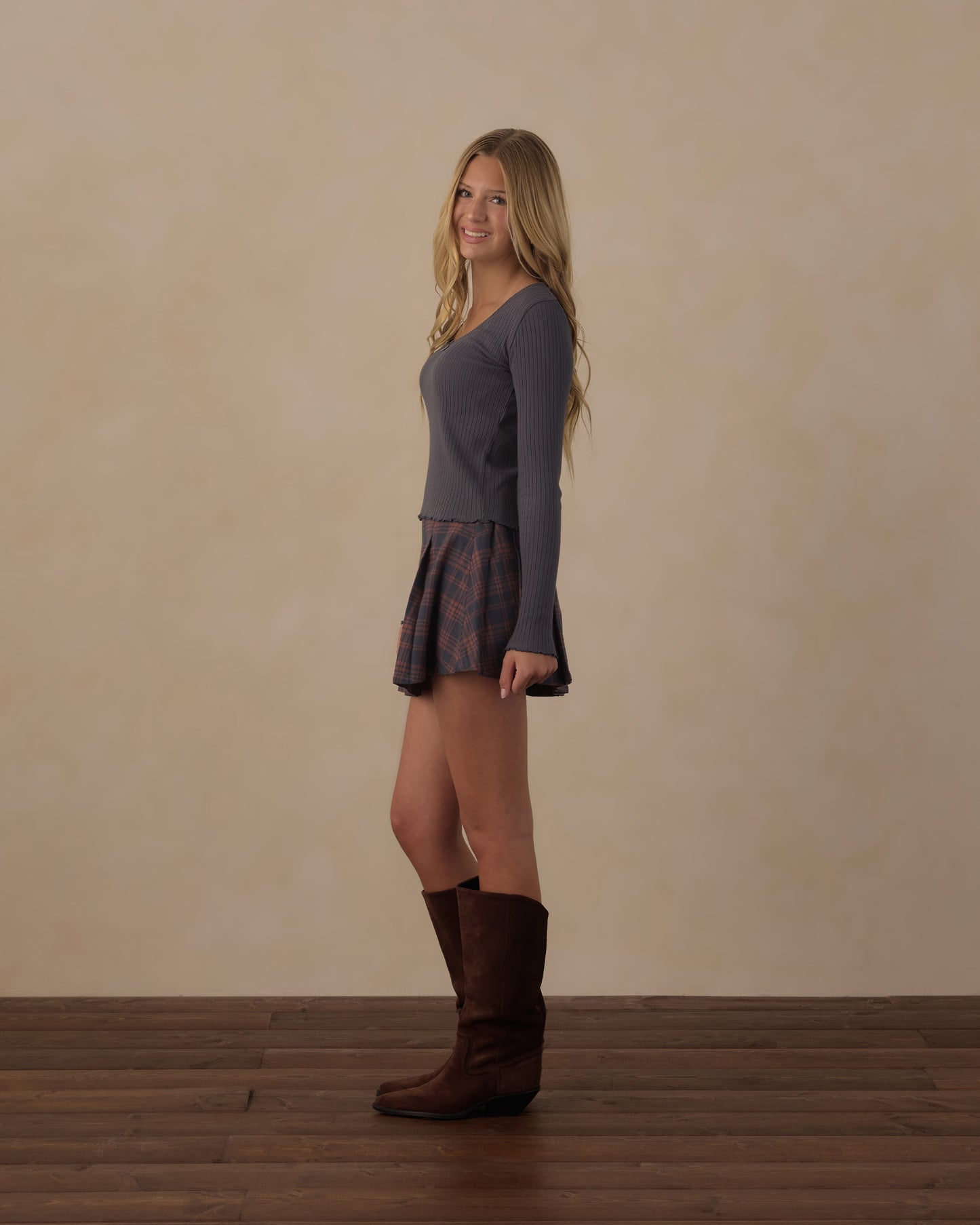 Teen Midnight Plaid Pleated Skirt by Rylee & Cru, shown in dark blue and black plaid fabric with pleats.