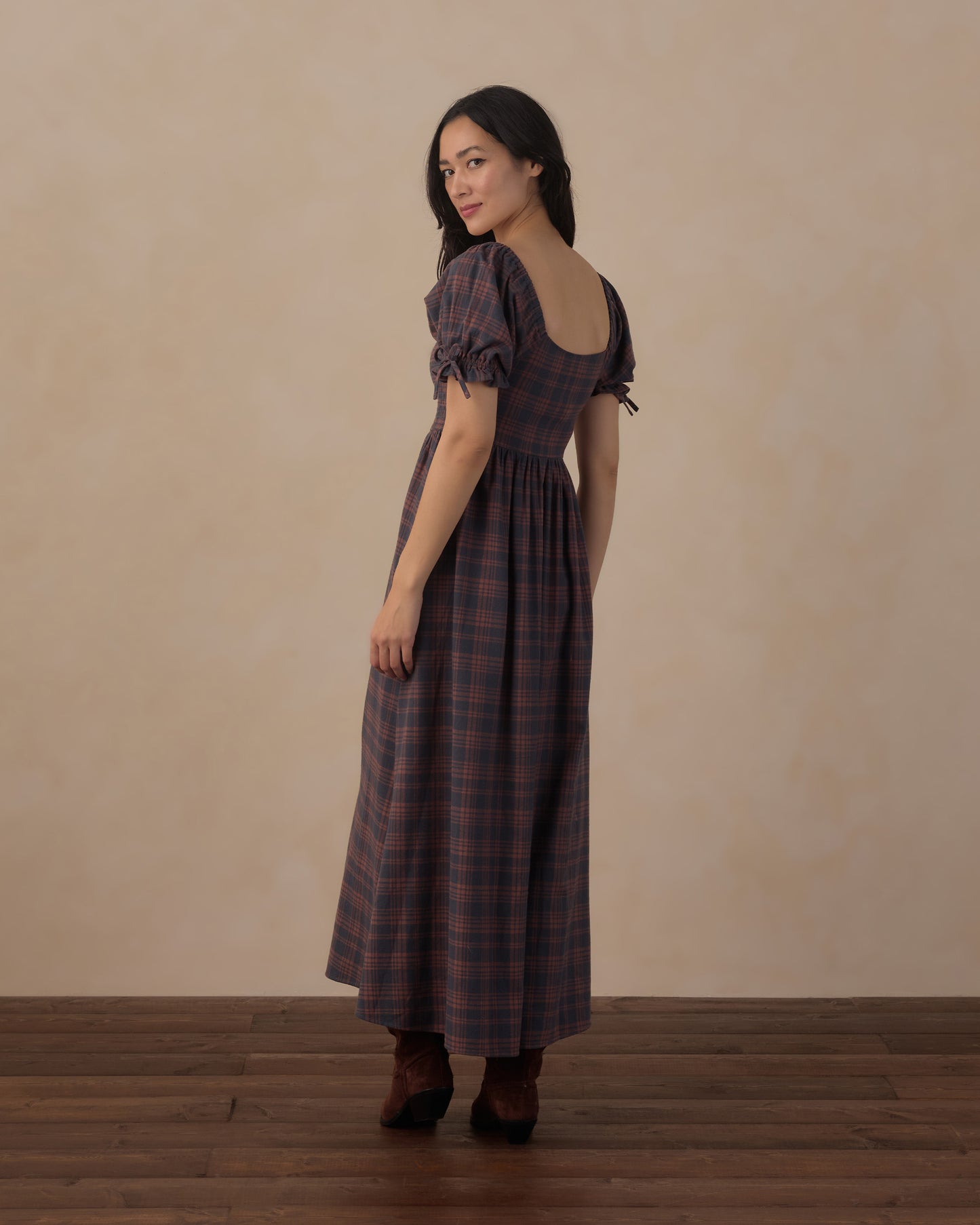 Women's midnight plaid Dallas dress by Rylee & Cru, featuring long sleeves and a relaxed fit, styled on a hanger.