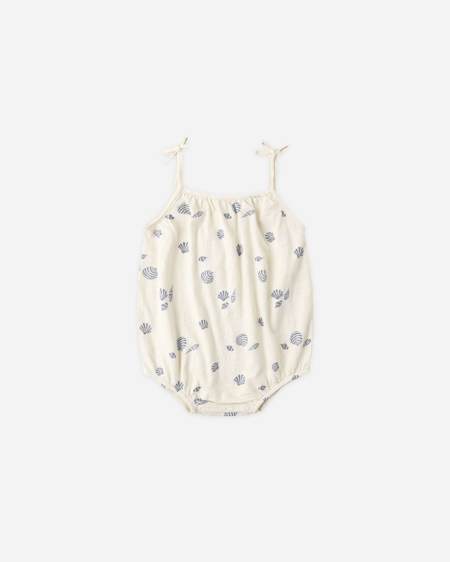 Natural-colored Seashells Nala romper by Rylee & Cru featuring a playful seashell print and soft fabric for comfortable wear.