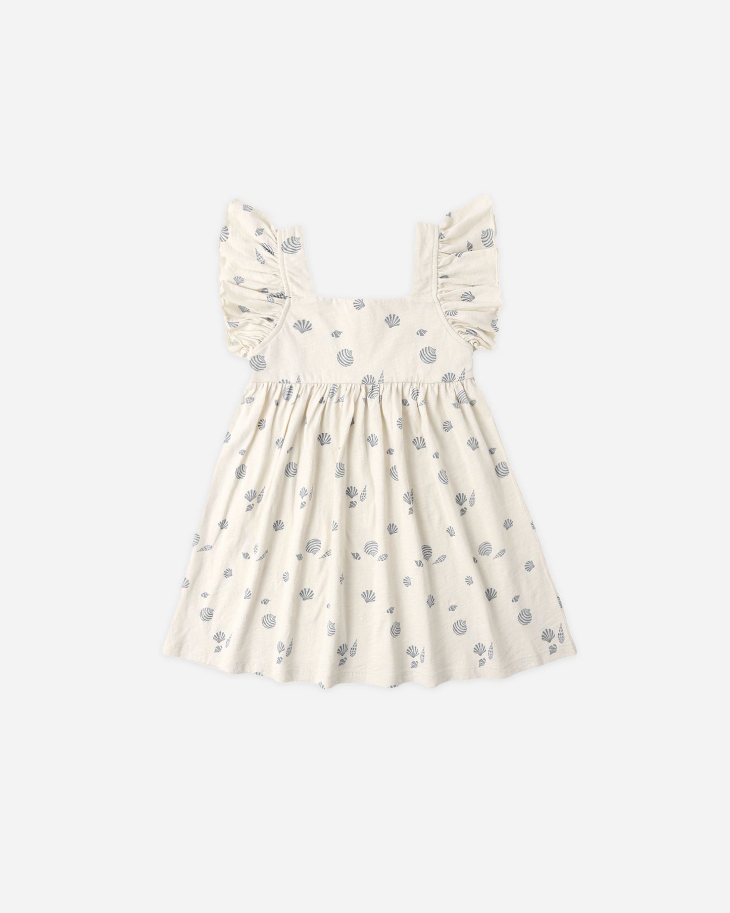 Rylee & Cru Seashells Mariposa dress in natural fabric featuring a seashell print and flowing design for girls.