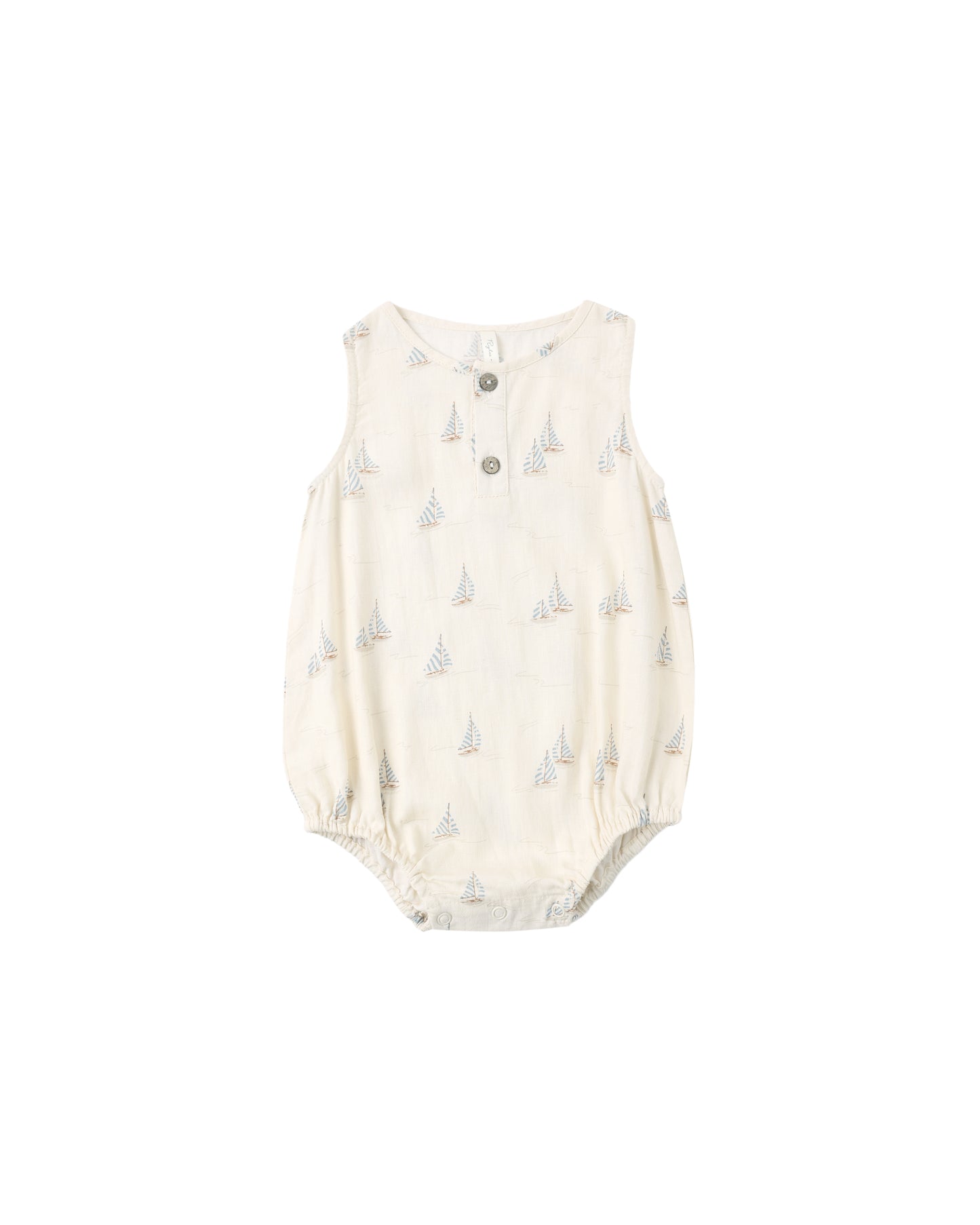 Rylee & Cru Sail Beau romper for babies, natural-colored soft cotton fabric with short sleeves and playful nautical design.