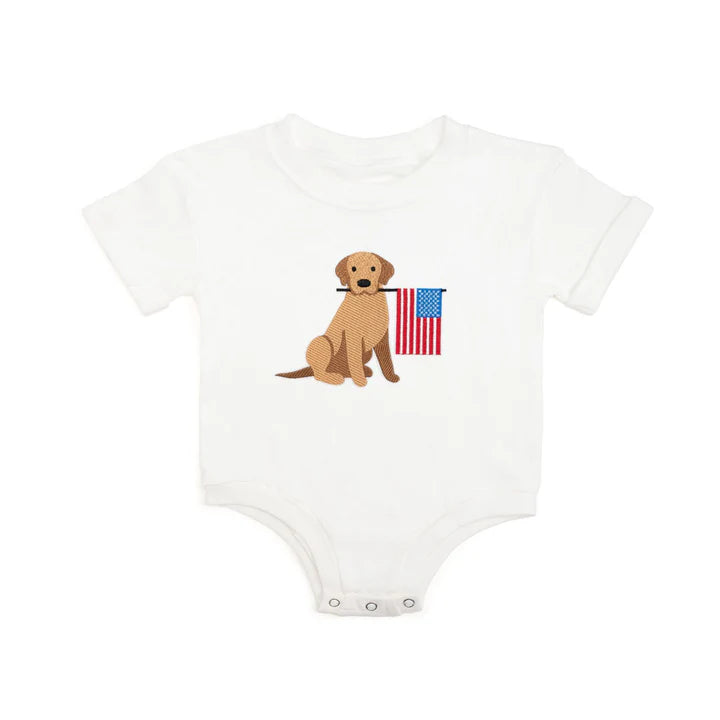 White short sleeve romper for babies featuring patriotic pup patch design, by Sweet Wink.