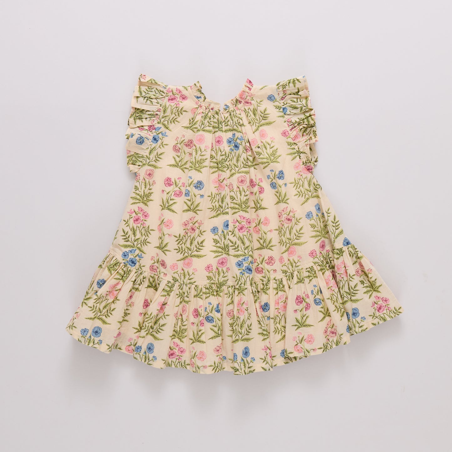 Girls' leafy floral Harper dress by Pink Chicken featuring a vibrant floral pattern and lightweight fabric.