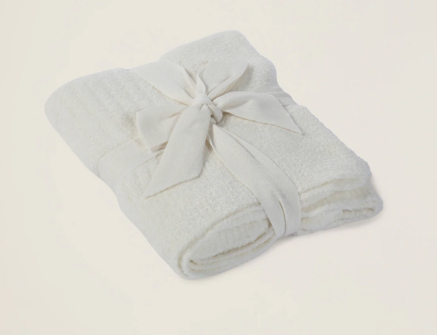 Barefoot Dreams Cozychic Lite ribbed baby blanket in Pearl, soft and cozy for infants, shown in a close-up image.