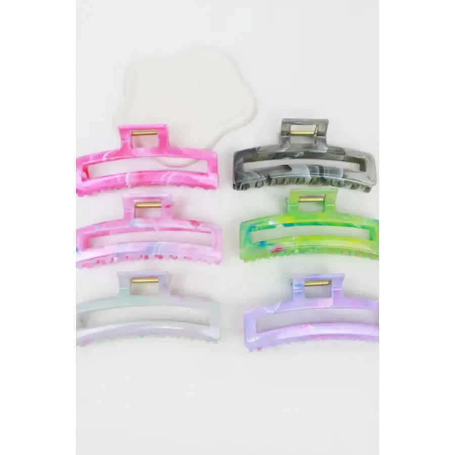 Love and Repeat shimmering marbled rectangle hair claw clip with cut-out design, perfect for stylish hair accessories.