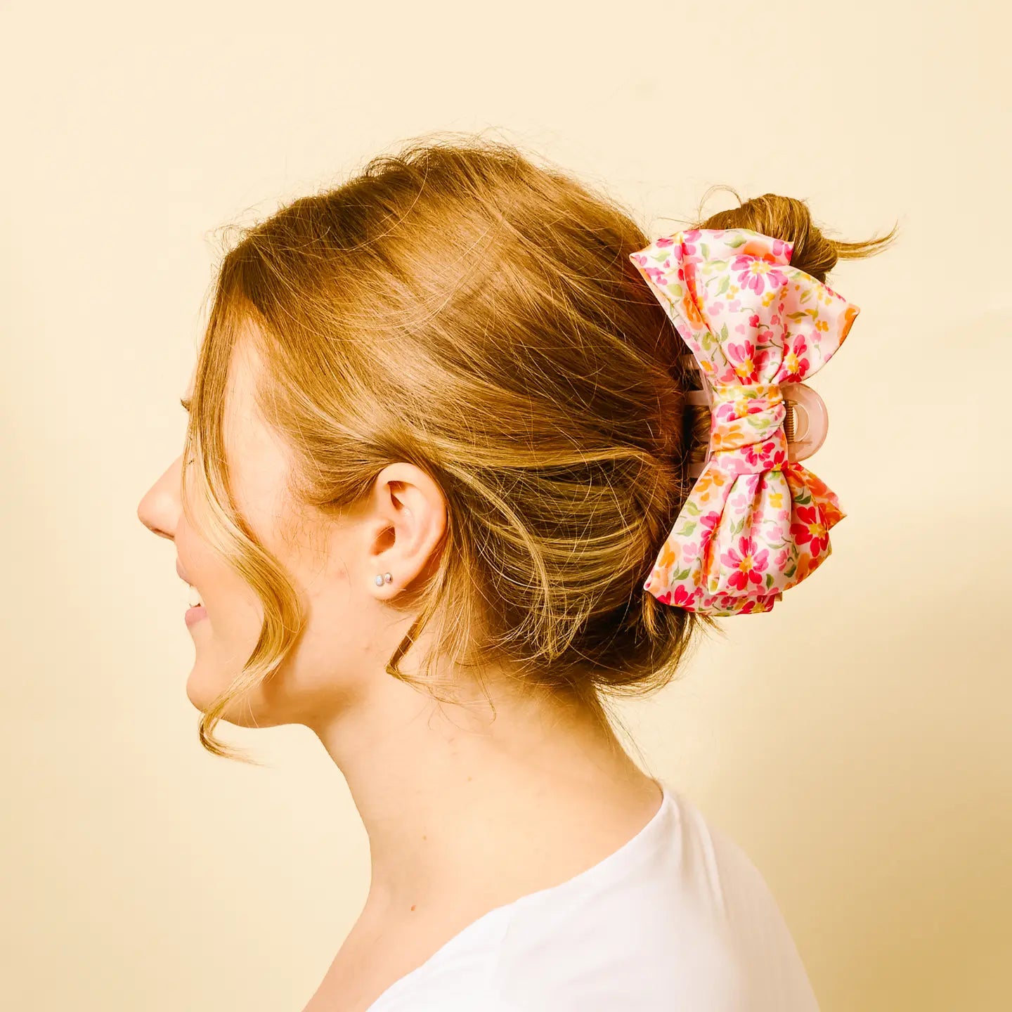 Secret Garden Pink satin bow claw clip by The Darling Effect, featuring a stylish bow design and glossy pink finish.