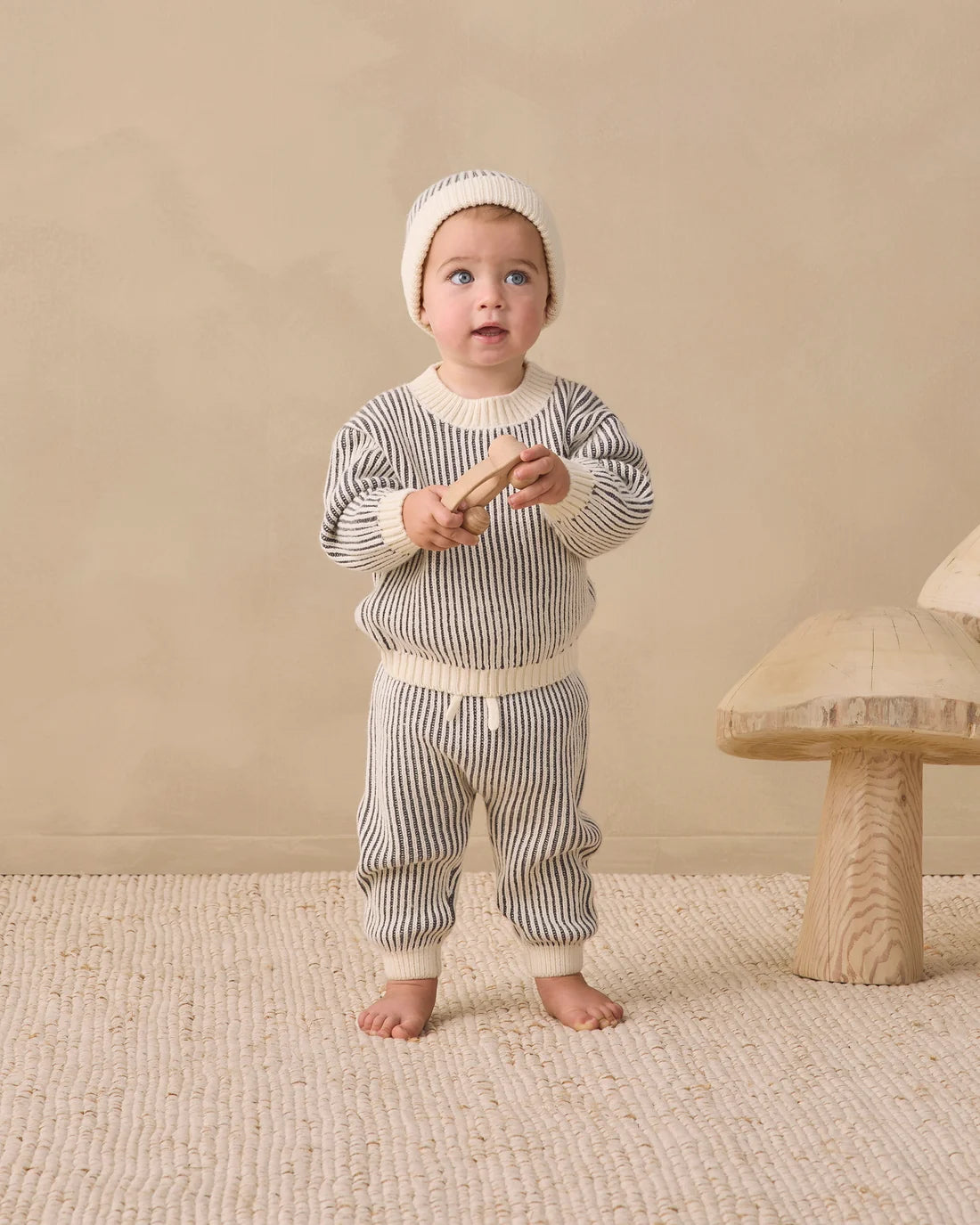 Quincy Mae Midnight Stripe Relaxed Knit Sweater shown in a cozy, relaxed fit with navy and white stripe pattern.