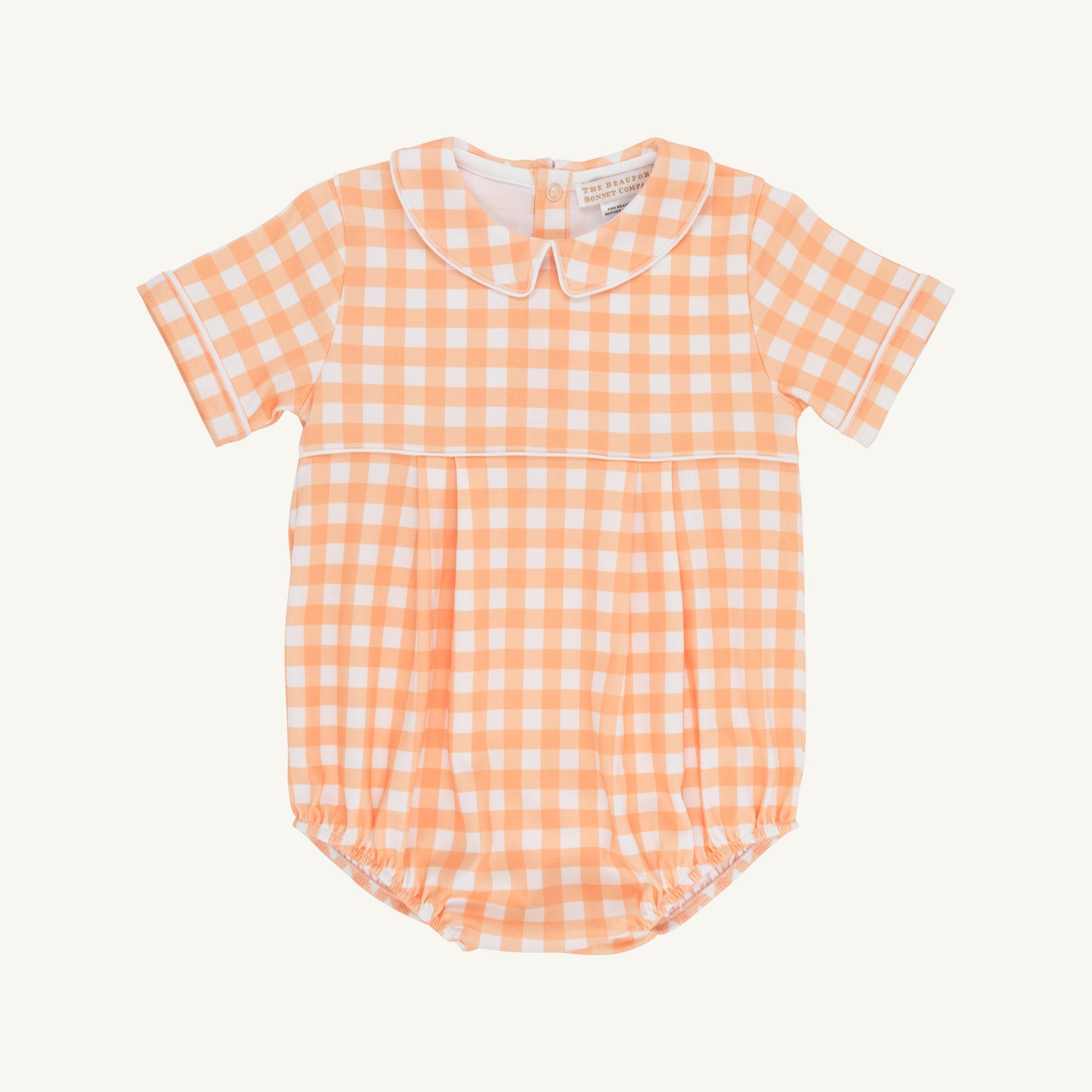 The Beaufort Bonnet Company Seashore Sherbet Gingham and Worth Ave White Bradford Bubble baby outfit on a hanger.