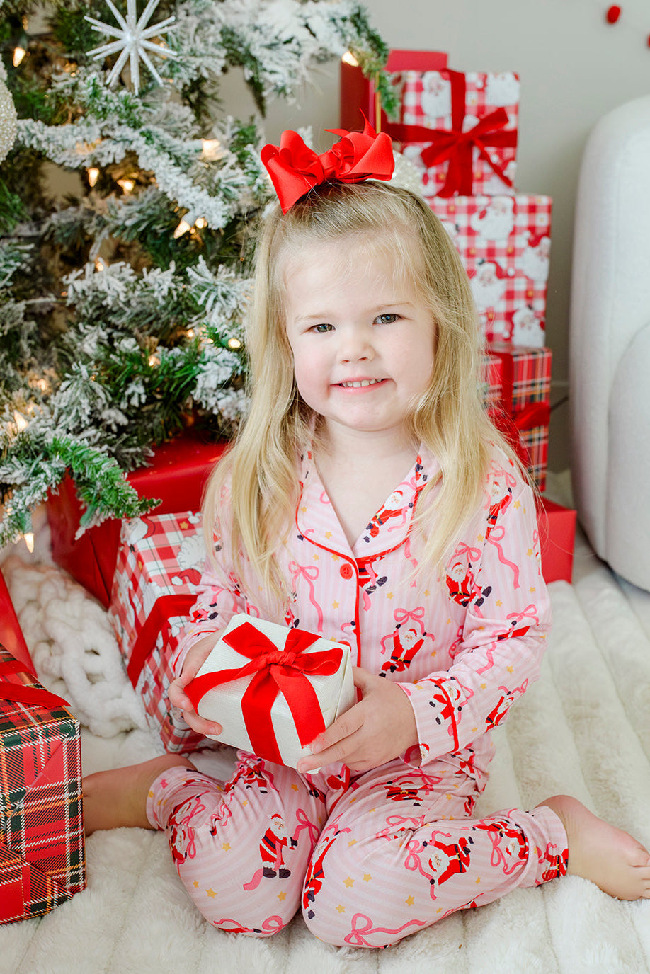 Caden Lane Jolly Ribbons Christmas two-piece flare lounge set with festive red and green ribbon patterns, cozy and stylish for holiday wear
