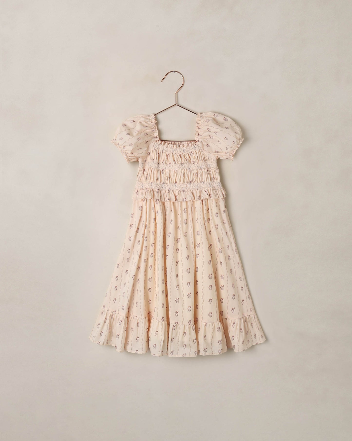 Noralee Floral Stripe Maggie Dress featuring vibrant floral and stripe pattern, lightweight fabric, and sleeveless design.