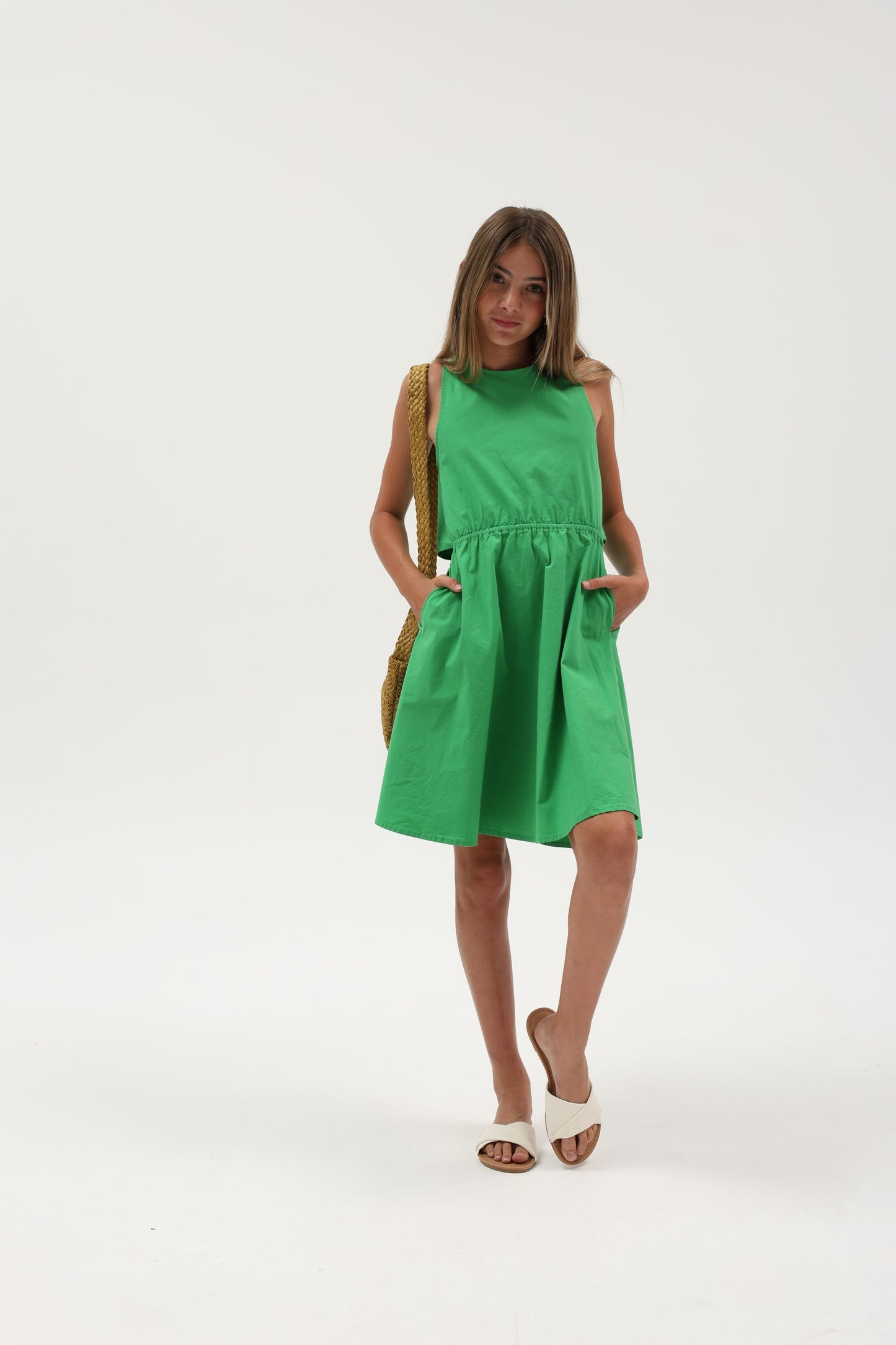 Seaweed print poplin peek-a-boo tie-back dress by TENLY with a fitted bodice and playful back detail.