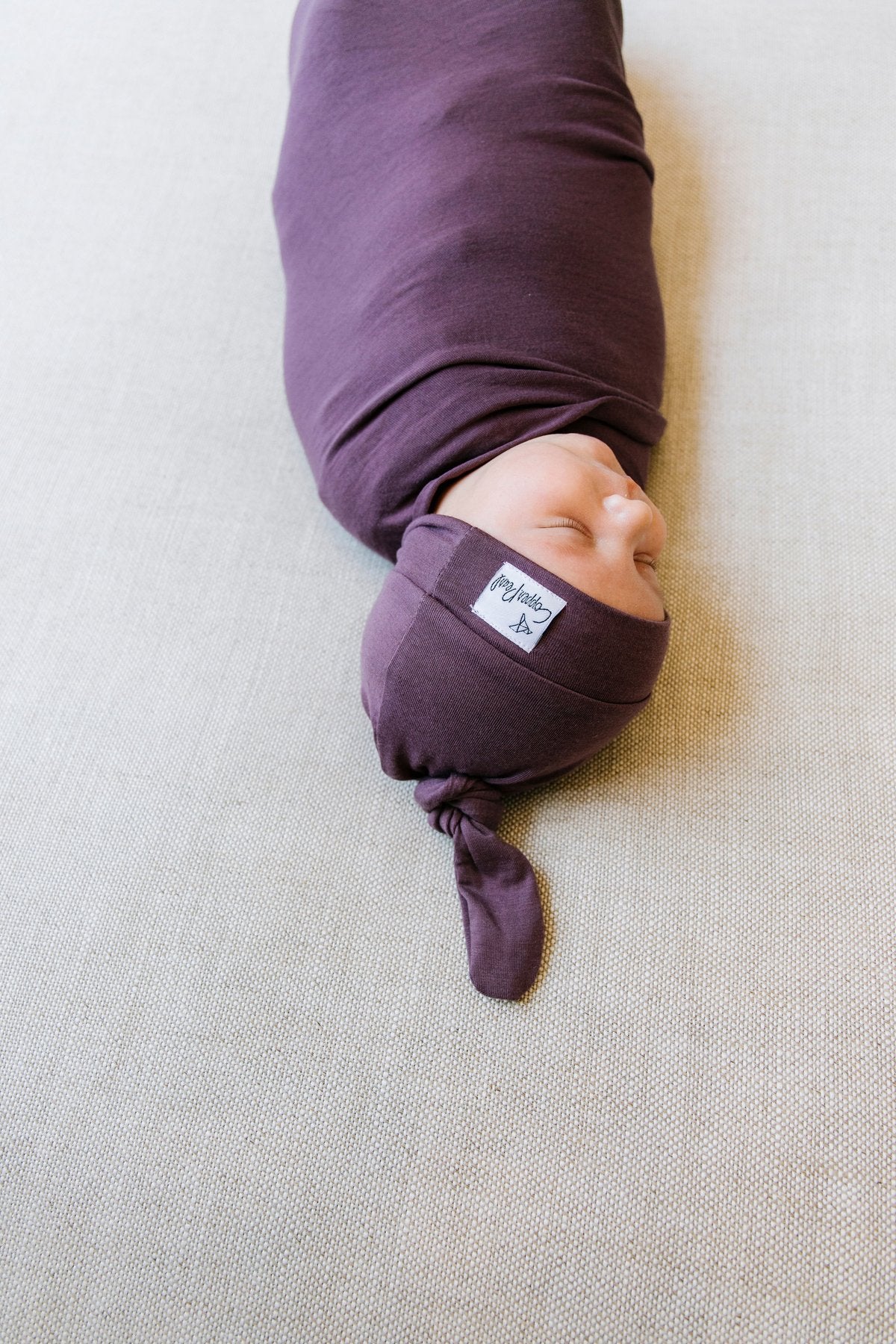 Copper Pearl Top Knot Hat - Plum