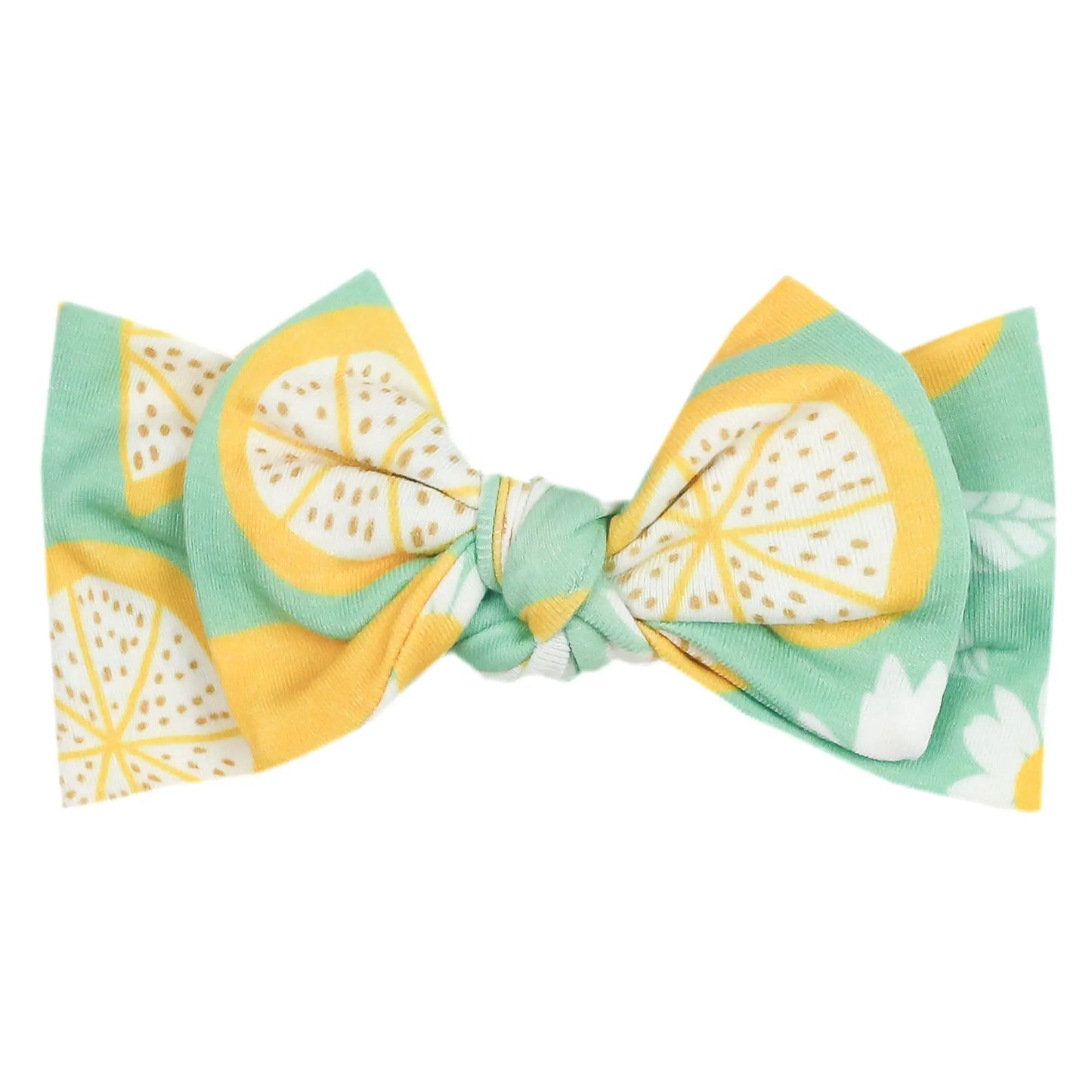 Copper Pearl Lemon headband with a bow, soft and stretchy fabric, perfect for babies and toddlers.
