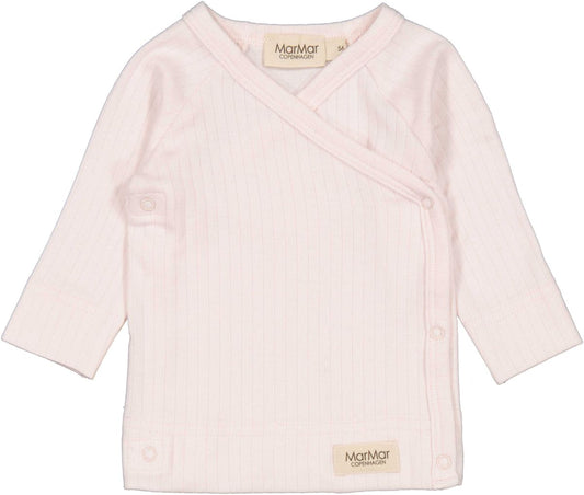 Mar Mar Rose Meringue Tuti Wrap from MarMar Copenhagen with pink and white floral pattern, soft fabric, and decorative ruffle details.