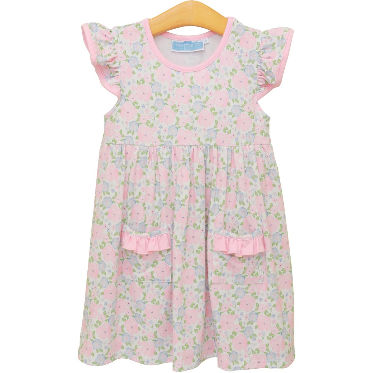 Trotter Street floral blossoms dress featuring a colorful floral print, sleeveless design, and flowy fabric.