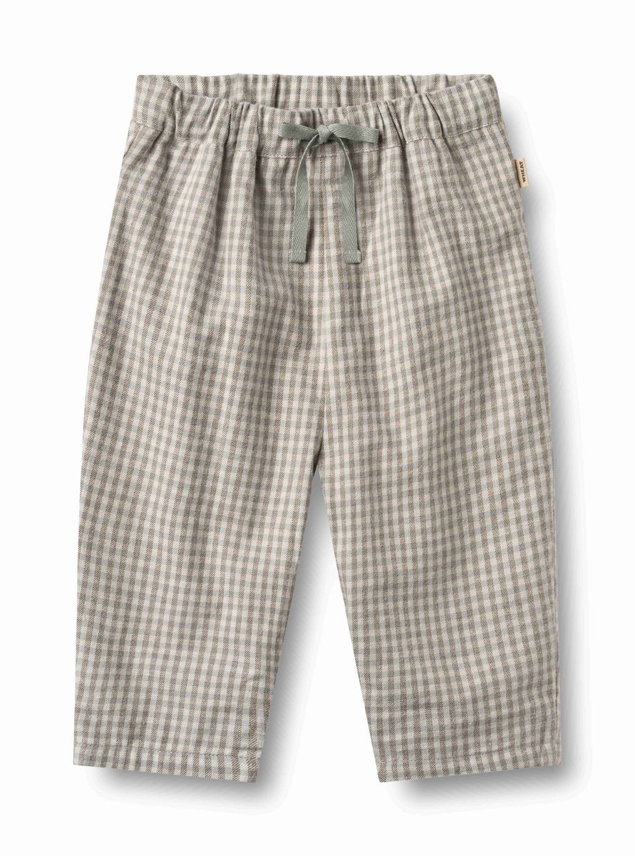 Greybrown check Arne lined trousers by Wheat, shown with waist and front pockets, tailored fit, and check pattern fabric.