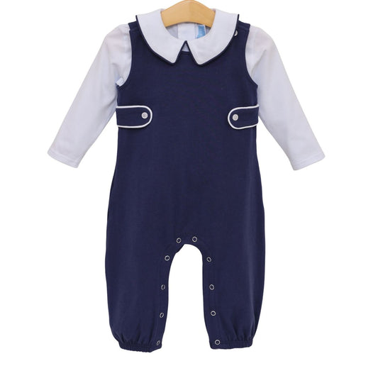 Navy Elijah Jon Jon set by Trotter Street displayed on a hanger, featuring classic navy fabric and button details for boys' casual wear.