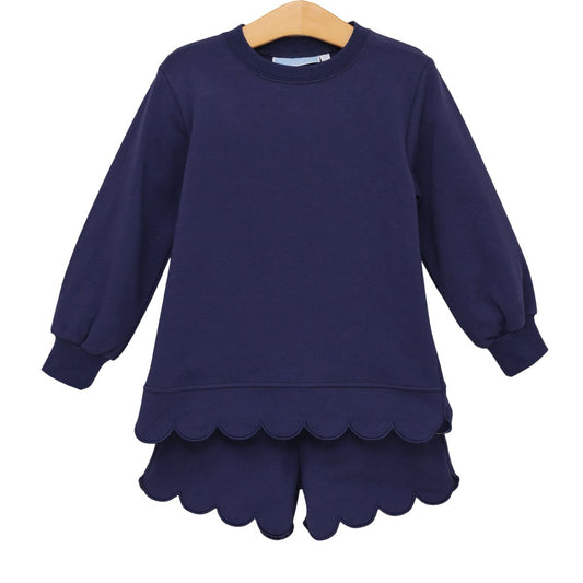 Navy Sophia scalloped set by Trotter Street featuring a stylish top with scalloped edges and matching bottoms on a mannequin.