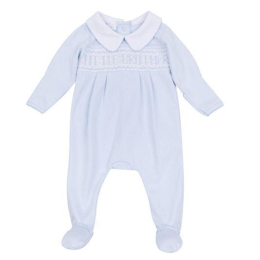 Light blue Magnolia Baby smocked footie for little brothers, featuring embroidered details and soft cotton fabric.