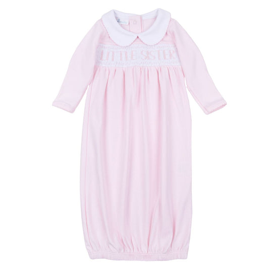 Pink Little Sister smocked gathered gown by Magnolia Baby, featuring soft fabric, ruffled details, and a sweet, classic design for little girls.