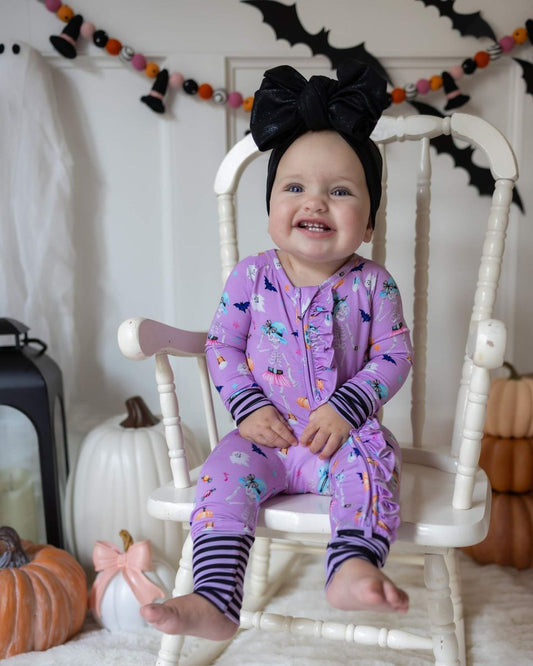 Lev Baby Blair Ruffled Poppy convertible romper with ruffled details, soft fabric, and bright floral pattern for infants.