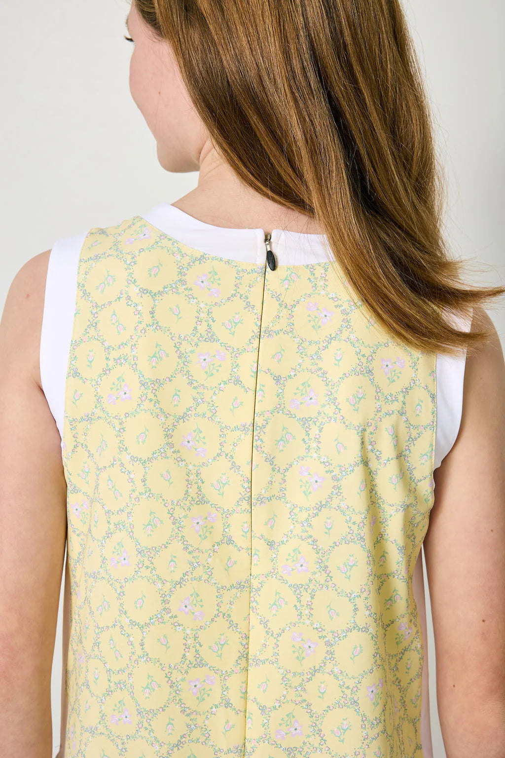 Courtside Kids Lemon Love Dress featuring bright yellow fabric with playful lemon print and sleeveless design.