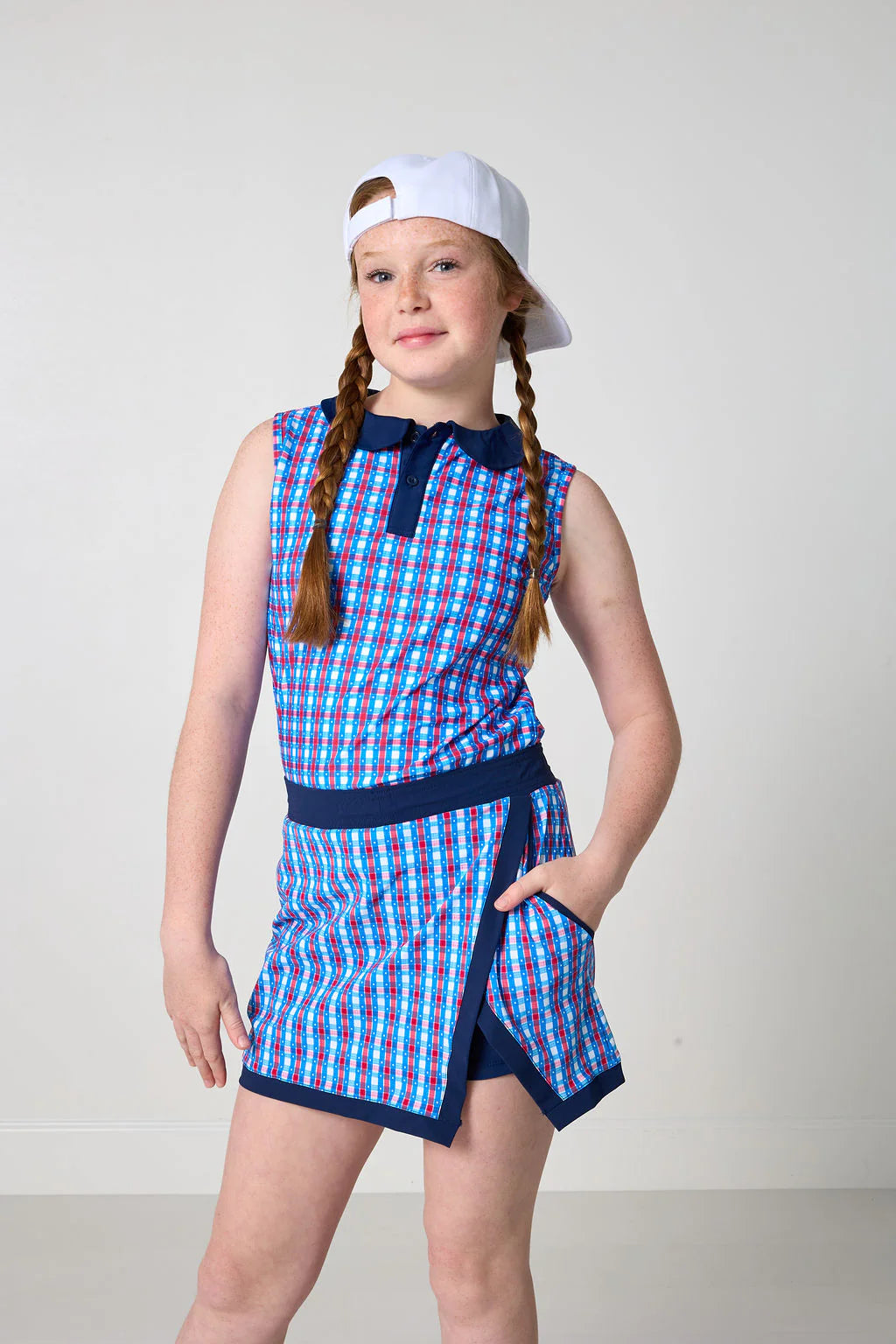 Red, white, and gingham girly girl tank top for kids by Courtside Kids, featuring a playful sleeveless design and vibrant pattern.