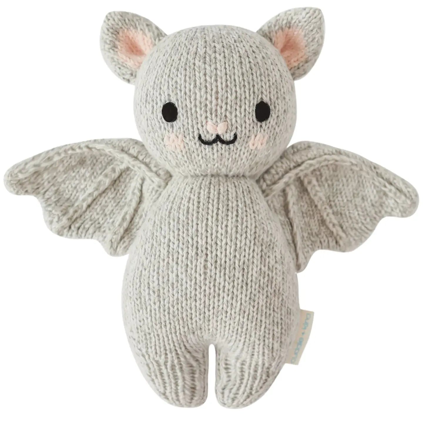 Grey baby bat plush from cuddle + kind featuring soft fabric and detailed bat wing design, perfect for cuddling and play.