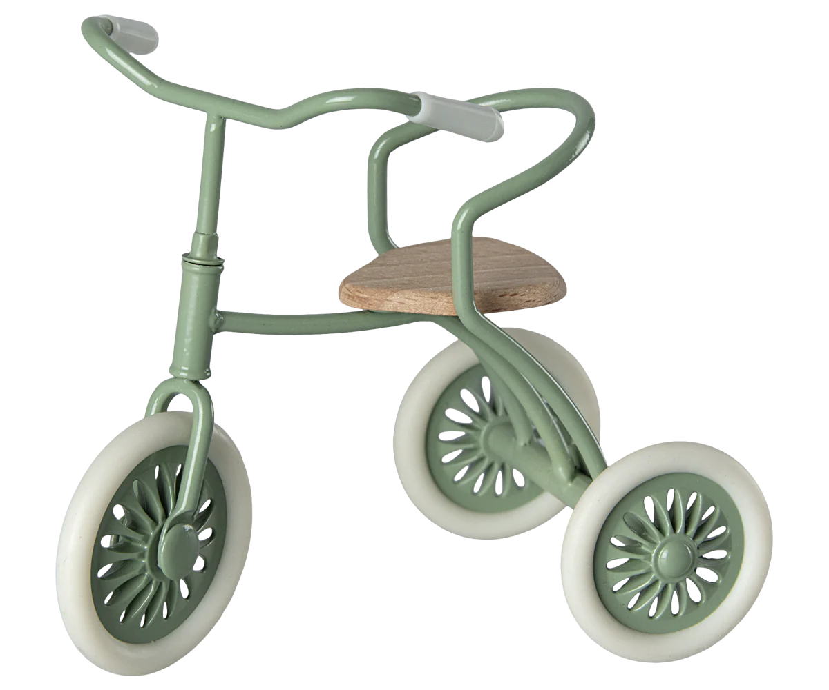 Maileg Green Mouse riding a tricycle toy with detailed green and white design, perfect for children's imaginative play.