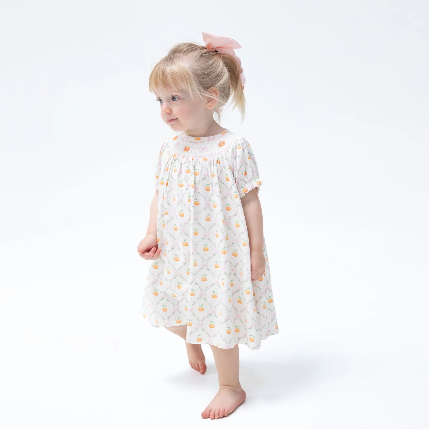 Angel Dear Pretty Pumpkin Trellis Jane Puff Sleeve Bishop Dress with matching bloomers for baby girls, featuring a charming pumpkin pattern.