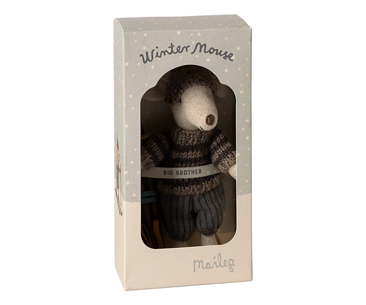 Grey winter mouse with ski set by Maileg, dressed as a big brother, bundled up in winter clothing and skis for play.