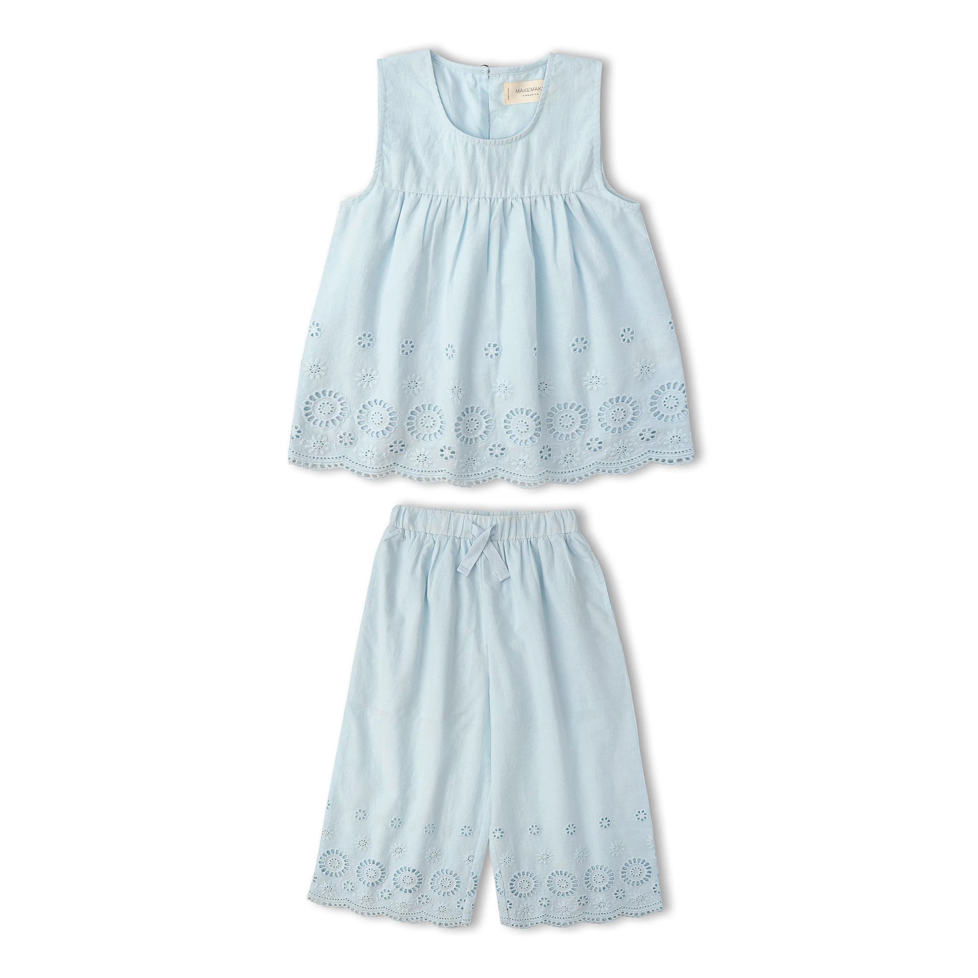 Light blue organic eyelet top and pant set by MakeMake, featuring eyelet details and relaxed fit in a stylish, breathable design.