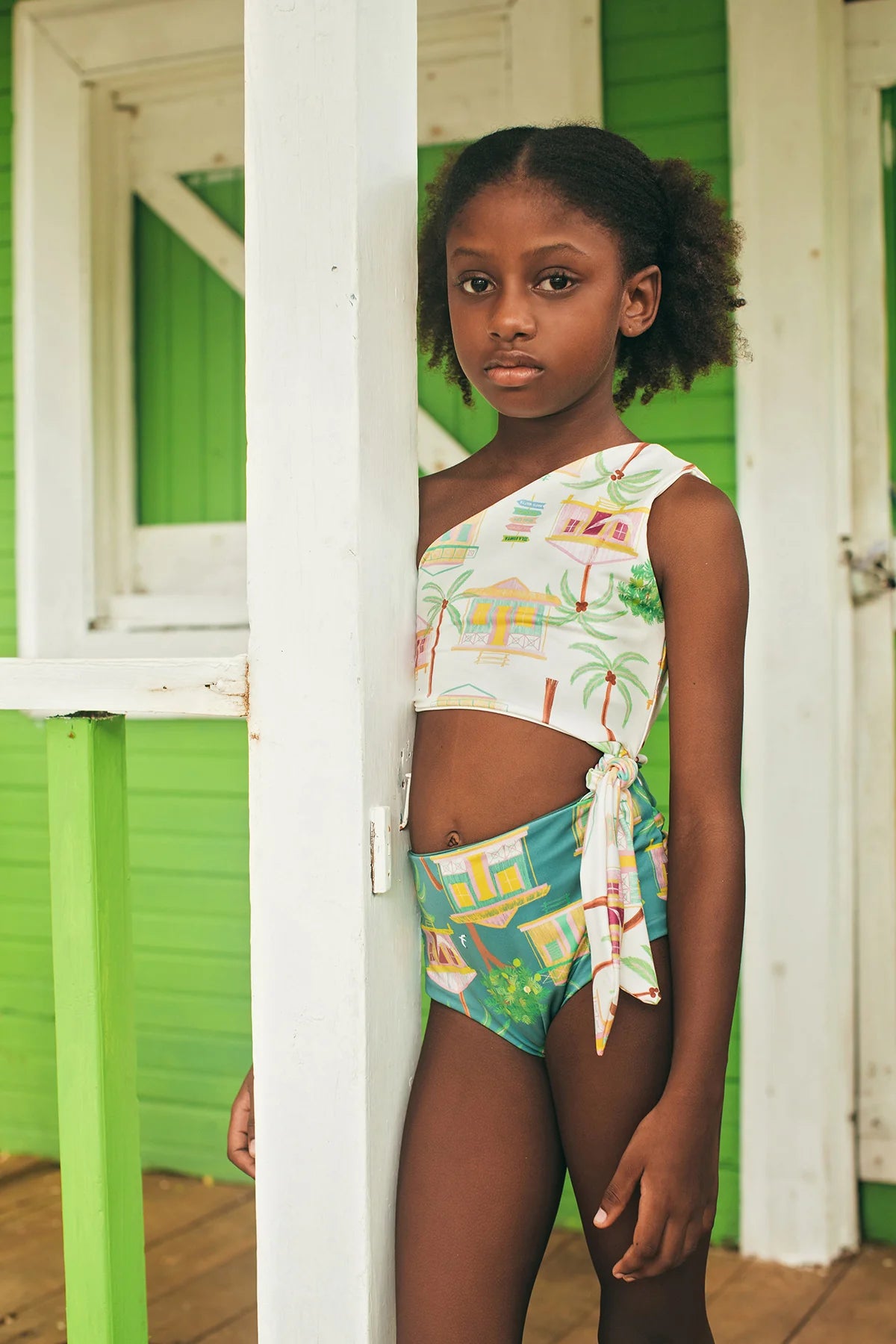 Pepita & Me Casitas Islenas Arena Knot Trikini in vibrant colors, featuring a stylish halter top and matching bottom, on a model.