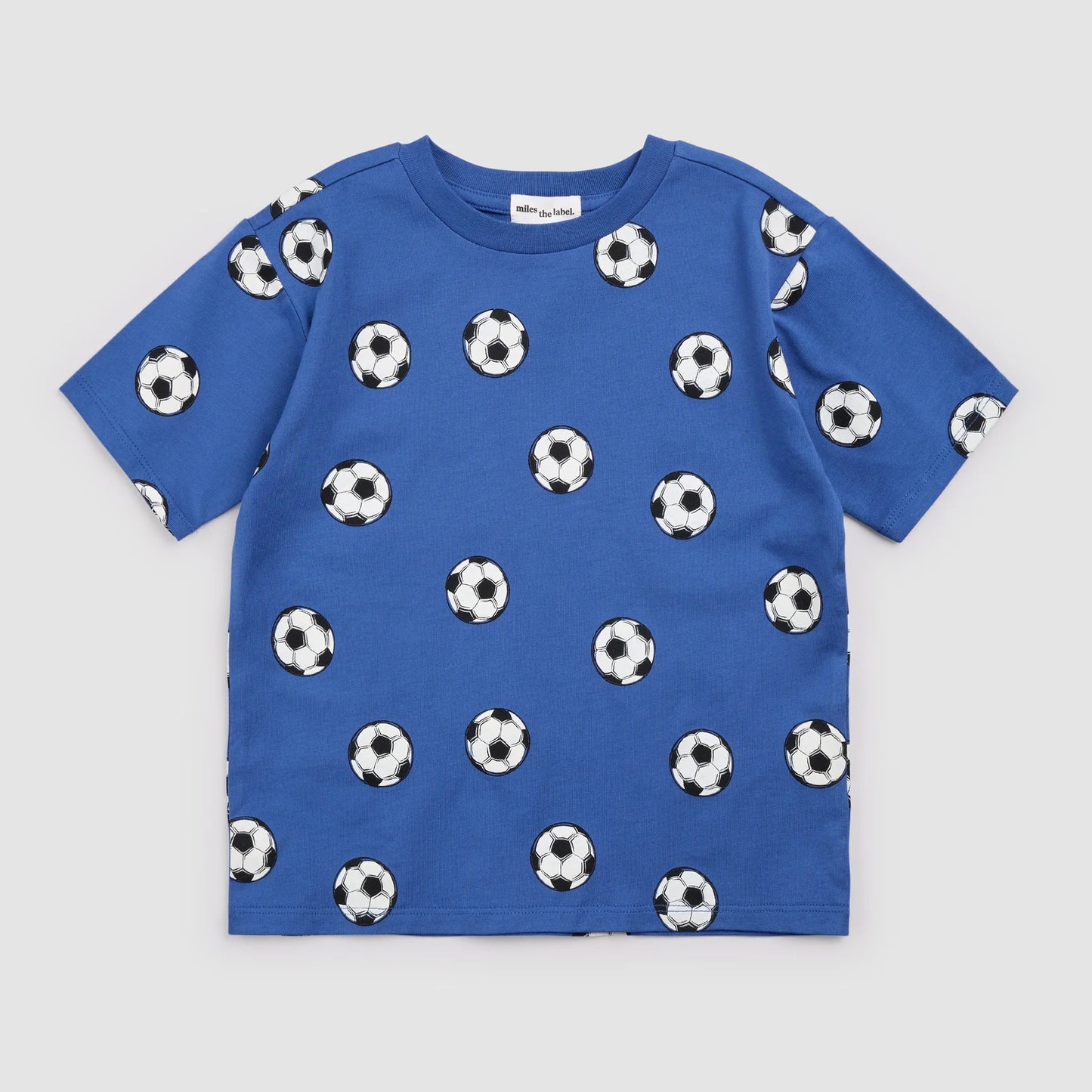 Royal blue soccer print shirt by Miles the Label featuring a vivid soccer graphic on soft fabric.