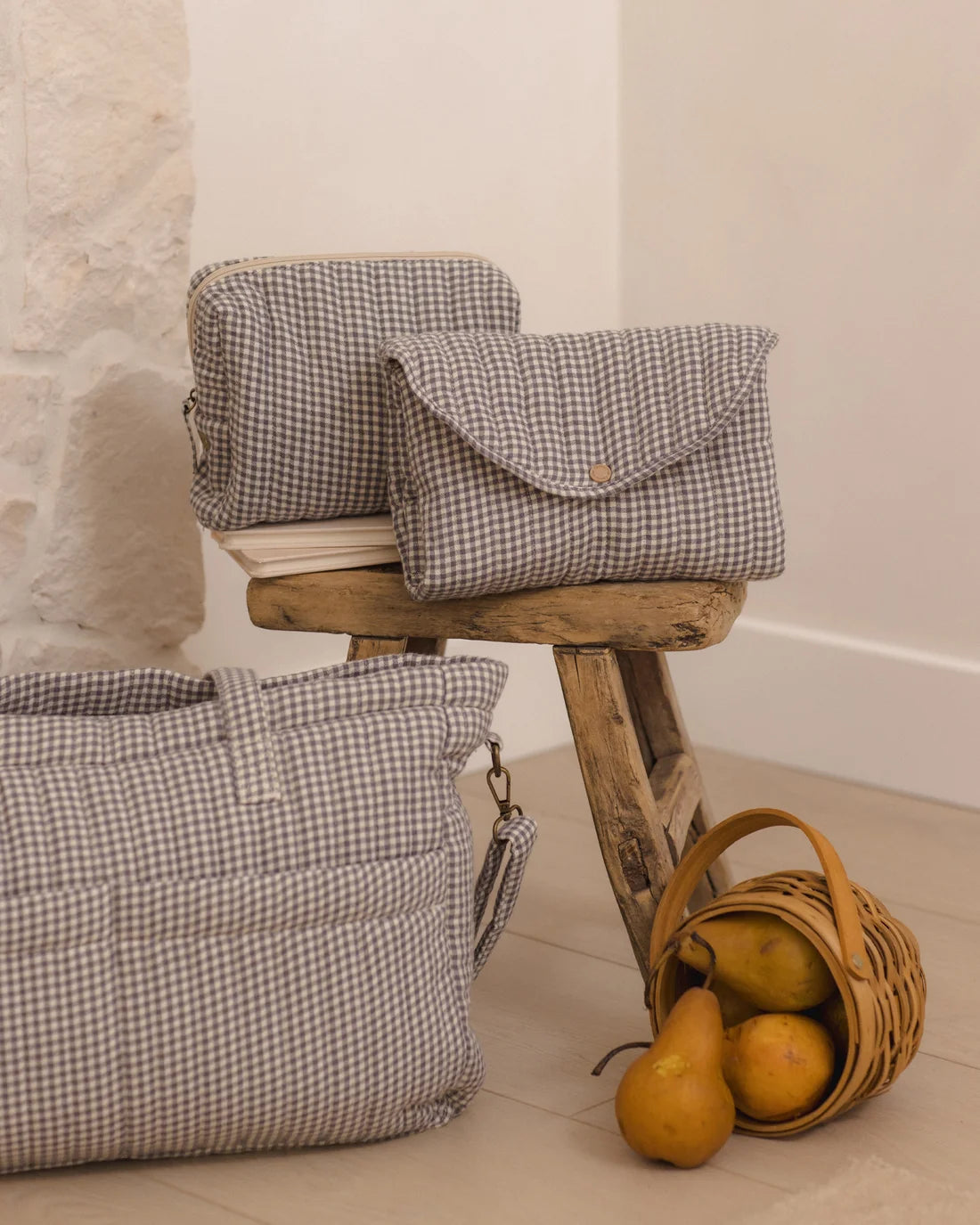 Quincy Mae Midnight Gingham Toiletry Bag with zipper closure and fabric handle, designed for travel and storage.