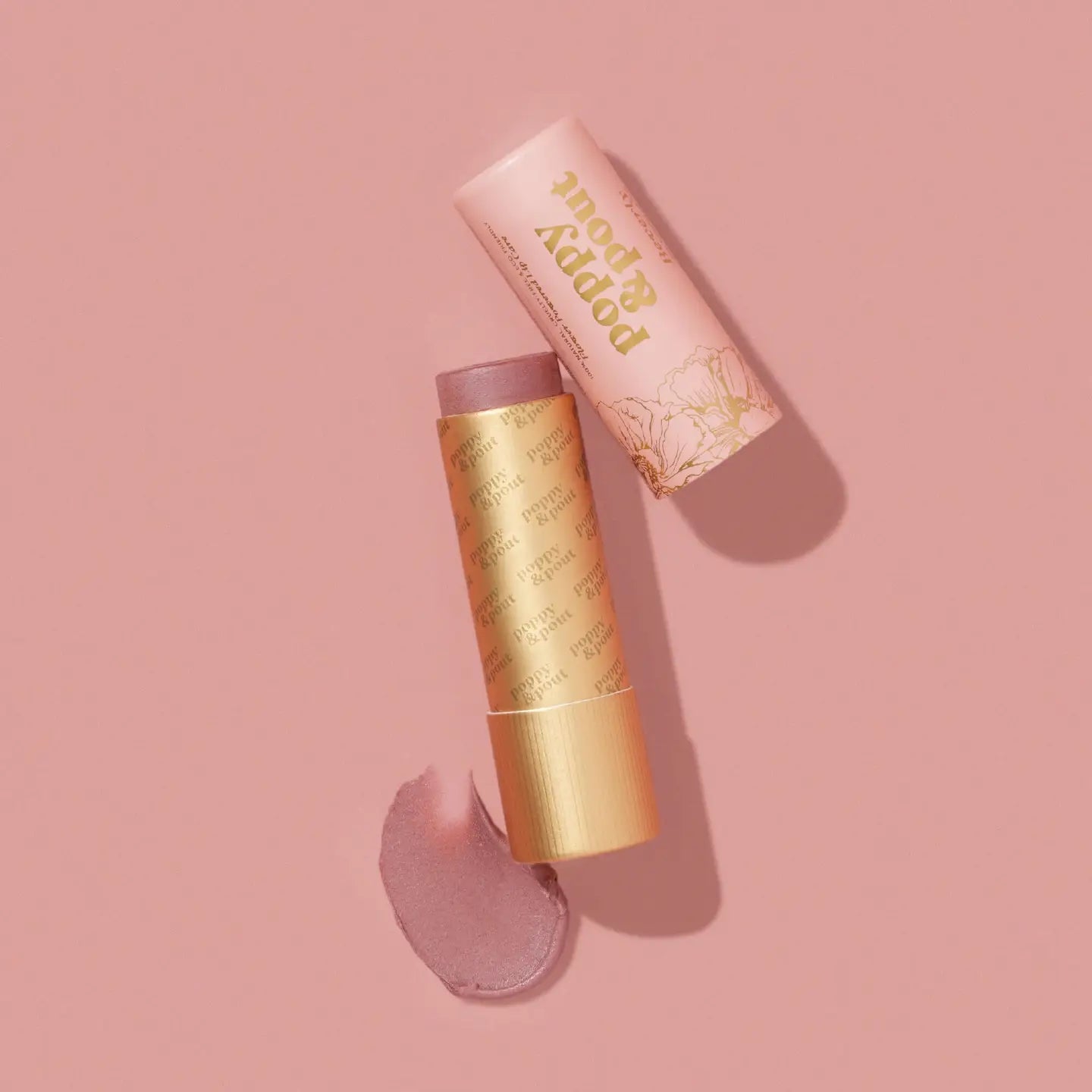 Sweet E's Children's Boutique Poppy & Pout Lip Tint in a small tube with a pink shade and applicator.