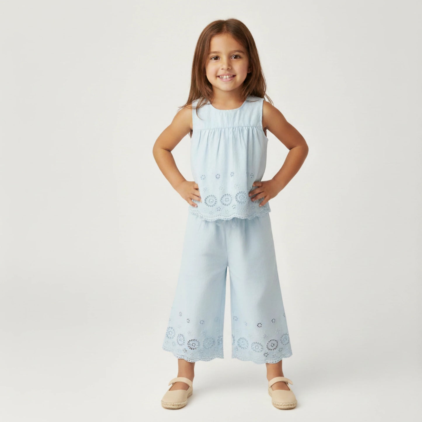 Light blue organic eyelet top and pant set by MakeMake, featuring eyelet details and a comfortable, stylish design.