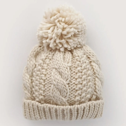 Huggalugs Natural Cable Beanie Baby for kids in soft, cozy knit with cable pattern, ideal for warm winter wear.