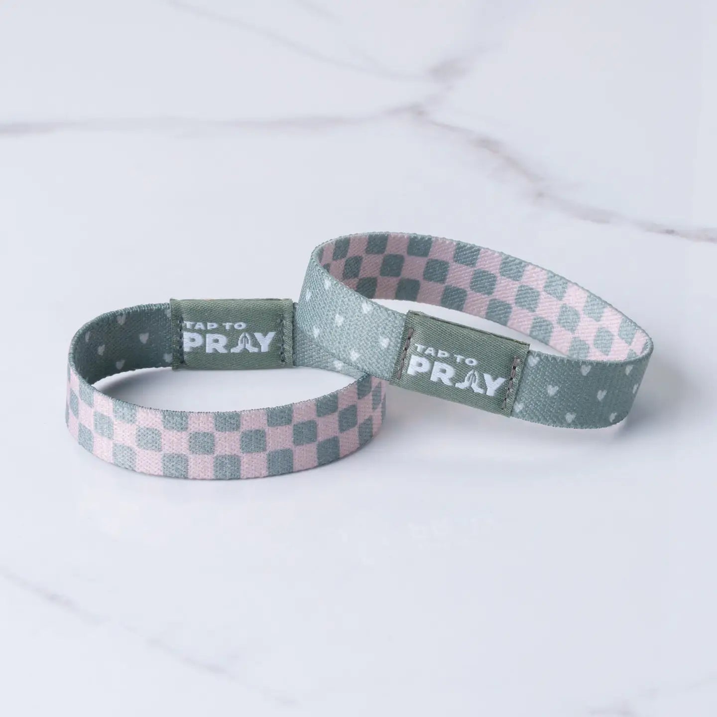 Versible Tap To Pray® wristband with cottage and tile design, featuring a comfortable fabric band and decorative pattern.